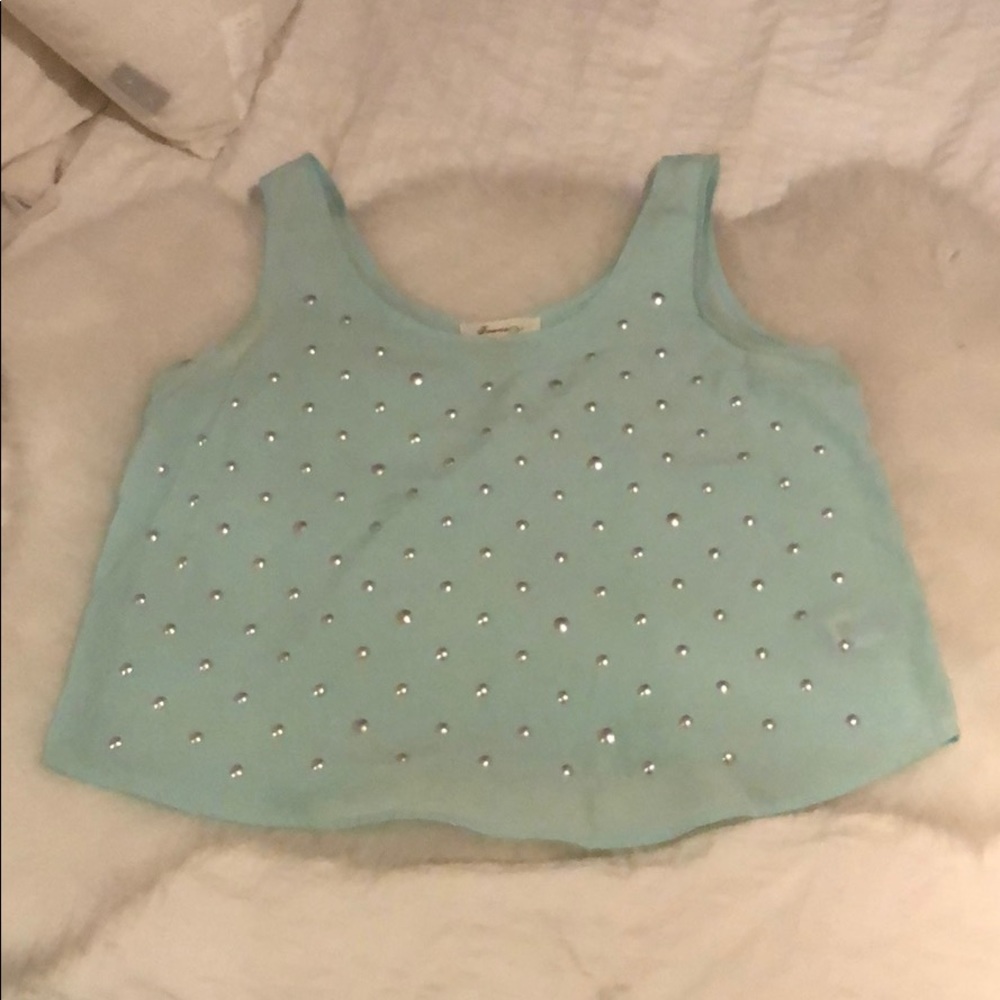 Turquoise tank with silver dots